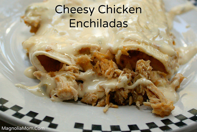 These Cheesy Chicken Enchiladas are incredible.  A must save recipe!